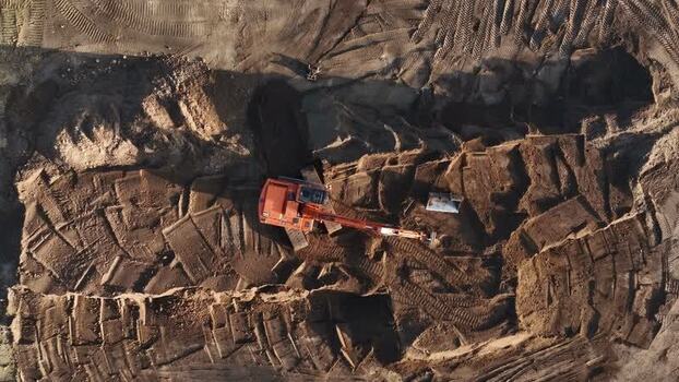 Aerial view of excavator in construction site Netherlands.