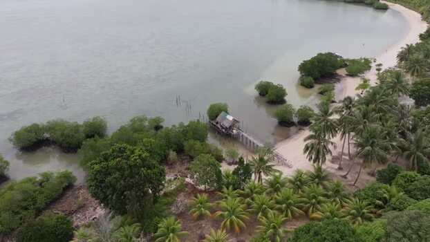Aerial view of stilt house on Batam Island coast Indonesia. Aerial view of stilt house on Batam Island coast Indonesia.