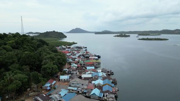 Aerial view of coastal village on Batam Island Indonesia. Aerial view of coastal village on Batam Island Indonesia.