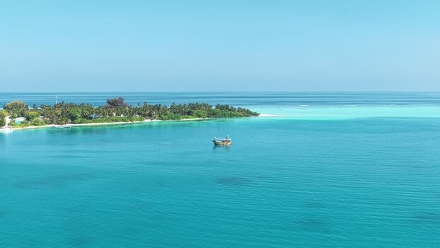 Aerial view of a tropical island and turquoise waters Maldives. Aerial view of a tropical island and turquoise waters Maldives.
