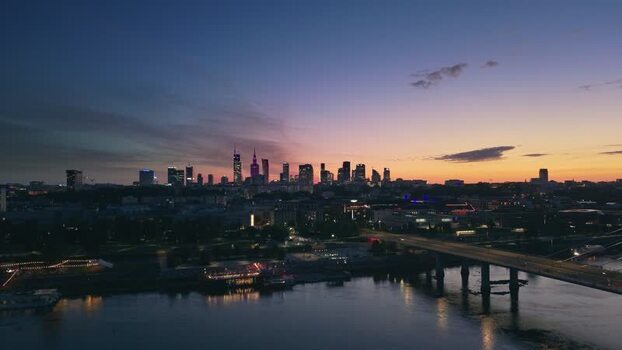Aerial view of Warsaw skyline at sunset over the Vistula Poland.