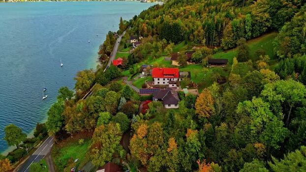 Aerial view of Attersee lake and forest in Vocklabruck Austria.