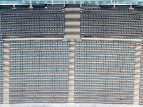 Berlin Germany 26 September 2026 Aerial view of Olympiastadion Berlin showing rows of empty stadium seats and concrete staircases from a high angle.