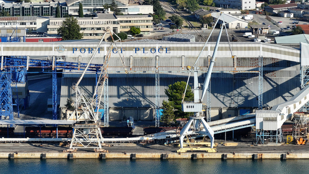 Aerial view of Port of Ploce with industrial cranes and harbor facilities in Croatia.