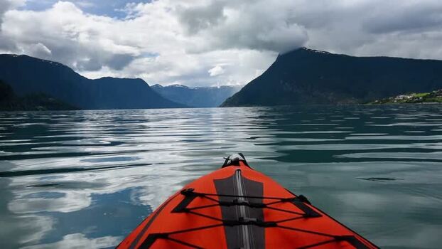 View of red kayak on Lustrafjorden Norway.