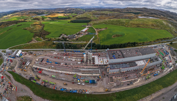 Aerial view of the Green Mountain SVG Undheim data center construction site with industrial buildings cranes and heavy machinery in the rural landscape of Undheim Rogaland Norway. Aerial view of the Green Mountain SVG Undheim data center construction site with industrial buildings cranes and heavy machinery in the rural landscape of Undheim Rogaland Norway.