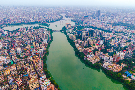 Dhaka Bangladesh 19 June 2026 Aerial view of Gulshan Lake surrounded by dense urban development high rise buildings and residential areas.