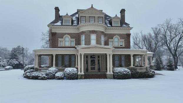 Aerial view of the historic Rivermont house covered in fresh snow during winter in Lynchburg Virginia United States.