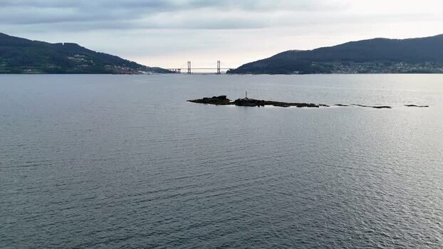 Aerial view of Illa Corveiro and Rande Bridge in Pontevedra Spain.
