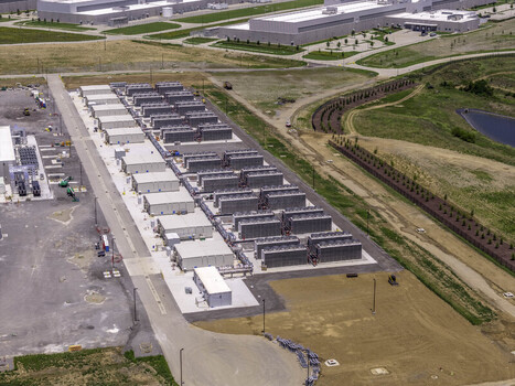 Aerial view of Meta Data Center air cooling system and backup generators with rows of industrial units and surrounding landscape in Gallatin Tennessee United States. Aerial view of Meta Data Center air cooling system and backup generators with rows of industrial units and surrounding landscape in Gallatin Tennessee United States.