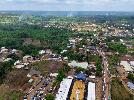 Aerial view of a vibrant gathering spot nestled amidst lush greenery where buildings meet the sky Awka Nigeria. Aerial view of a vibrant gathering spot nestled amidst lush greenery where buildings meet the sky Awka Nigeria.