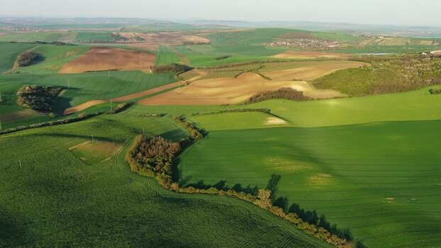 Aerial view of rolling green hills in South Moravian Region Czechia.