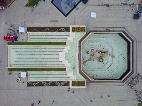 Aerial view of the NDK square featuring its large octagonal fountain geometric stone paving and green garden strips in Sofia Sofia City Province Bulgaria. Aerial view of the NDK square featuring its large octagonal fountain geometric stone paving and green garden strips in Sofia Sofia City Province Bulgaria.