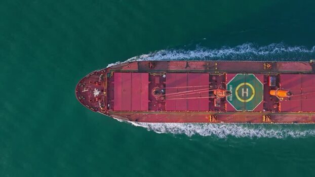 Aerial view of a large cargo ship with a helipad on deck Netherlands.