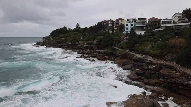 View of Bondi Beach coastline with residential houses Australia.