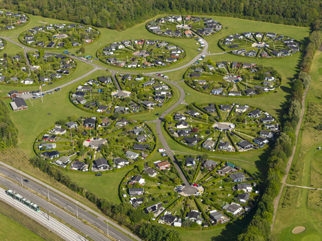 Aerial view of the unique circular garden allotments of Brondby Haveby with green hedges and small houses in Brondby Denmark. Aerial view of the unique circular garden allotments of Brondby Haveby with green hedges and small houses in Brondby Denmark.