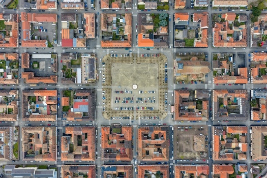 Aerial view of the perfectly symmetrical star shaped layout of the town with its central square a testament to Vauban s military architecture Neuf Brisach Grand Est France.