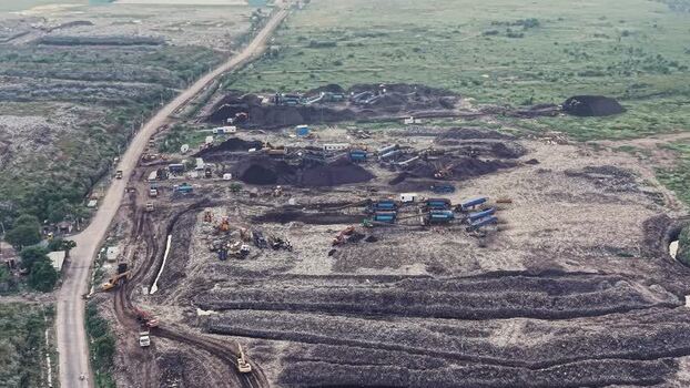 Aerial view of waste recycling processing unit in India. Aerial view of waste recycling processing unit in India.