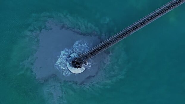 Aerial view of a structure in water United States. Aerial view of a structure in water United States.