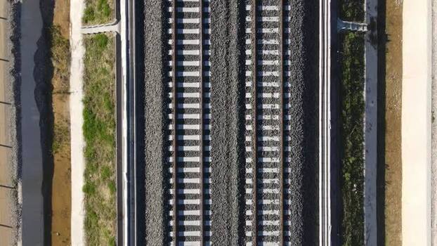 Aerial view of railway tracks and gravel Italy.