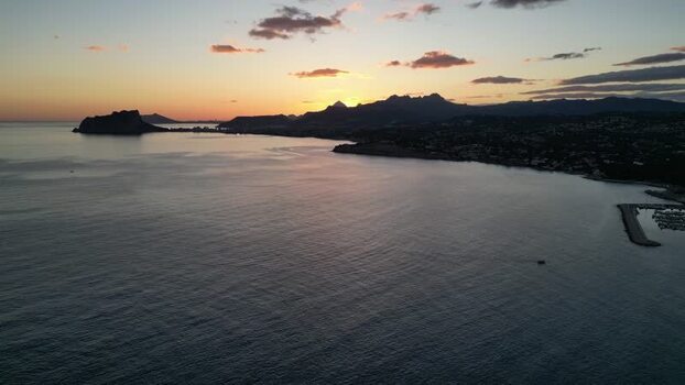 Aerial view of Moraira coastline at sunset Spain.