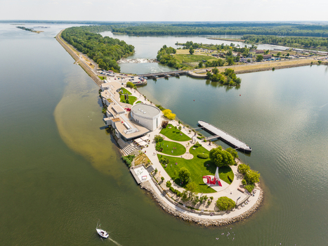 Aerial view of the Danubiana Meulensteen Art Museum on a peninsula in the Danube river with green lawns and sculptures Bratislava Bratislavsky kraj Slovakia. Aerial view of the Danubiana Meulensteen Art Museum on a peninsula in the Danube river with green lawns and sculptures Bratislava Bratislavsky kraj Slovakia.