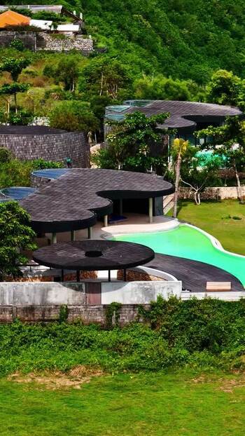 Aerial view of modern resort with swimming pools in Bali Indonesia.
