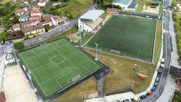 Ourense Spain 30 April 2026 Aerial view of Campo Municipal de Oira soccer fields with artificial turf a small grandstand and surrounding residential houses. Ourense Spain 30 April 2026 Aerial view of Campo Municipal de Oira soccer fields with artificial turf a small grandstand and surrounding residential houses.