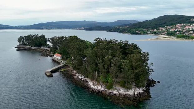 Aerial view of Isla de San Anton and the coastline Spain.