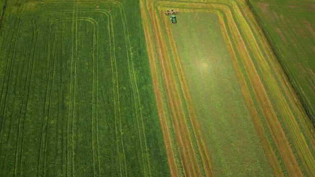 Aerial view of tractor harvesting in Stardalen Norway.
