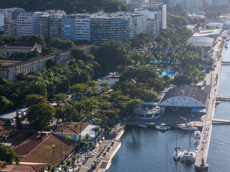 Rio de Janeiro Brazil 19 June 2026 Aerial view of the Iate Clube do Rio de Janeiro featuring the marina with docked sailboats lush green trees swimming pools and surrounding urban architecture.