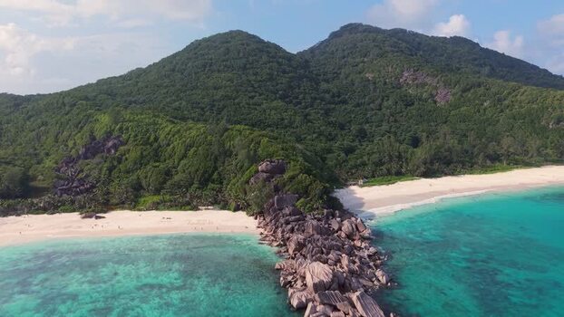 Aerial view of Anse Reunion beach with granite boulders Seychelles.