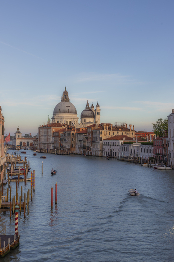 View of the Santa Maria della Salute basilica and historic buildings along the Grand Canal in Venice Veneto Italy. View of the Santa Maria della Salute basilica and historic buildings along the Grand Canal in Venice Veneto Italy.