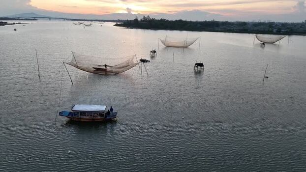 Aerial view of Thu Bon River with fishing nets in Hoi An Vietnam. Aerial view of Thu Bon River with fishing nets in Hoi An Vietnam.