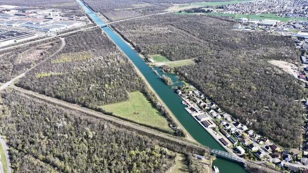 Aerial view of canal and forest landscape France.