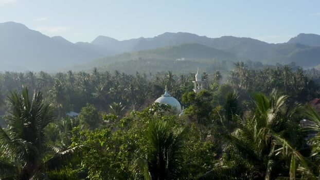 Aerial view of Sumberkima mosque and tropical forest Indonesia. Aerial view of Sumberkima mosque and tropical forest Indonesia.