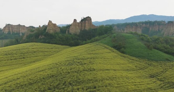 Aerial view of the Balze del Valdarno rock formations and green hills Italy. Aerial view of the Balze del Valdarno rock formations and green hills Italy.