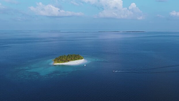 Aerial view of a tropical island and turquoise waters Maldives. Aerial view of a tropical island and turquoise waters Maldives.