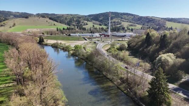Aerial view of the Orava river and industrial plant Slovakia.
