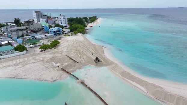 Aerial view of beach construction on Gulhi island Maldives.