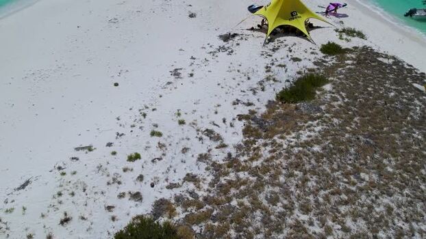 Aerial view of Los Roques archipelago beach with kite gear Venezuela.