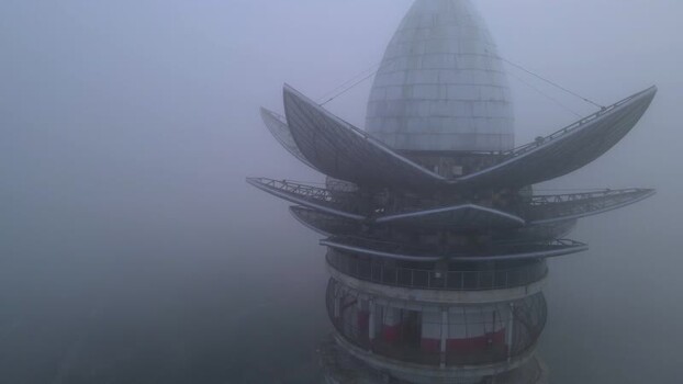 Aerial view of Menara Pandang Teratai in thick fog Indonesia