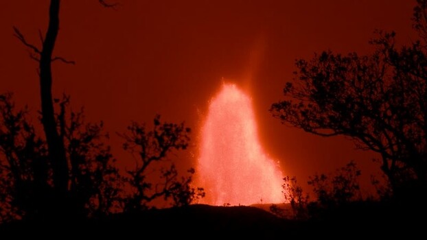 View of Halemaumau Crater lava fountain at night United States.