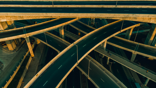Aerial view of the multi level Pokuase Interchange featuring complex concrete pillars and asphalt roads in Ga North Municipal Greater Accra Region Ghana. Aerial view of the multi level Pokuase Interchange featuring complex concrete pillars and asphalt roads in Ga North Municipal Greater Accra Region Ghana.