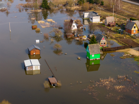Kedainiai Lithuania 17 March 2026 Aerial view of flooded houses and cottages surrounded by rising river water and bare trees during spring floods. Kedainiai Lithuania 17 March 2026 Aerial view of flooded houses and cottages surrounded by rising river water and bare trees during spring floods.