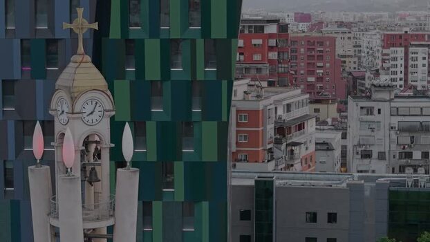 Aerial view of a church clock tower and urban skyline Albania.