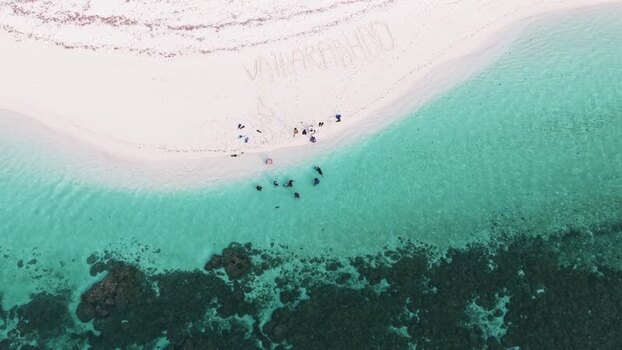 Aerial view of Vaikaradhoo Thundi beach in the Maldives. Aerial view of Vaikaradhoo Thundi beach in the Maldives.