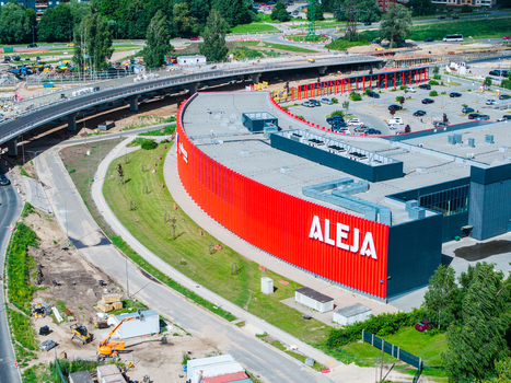 Riga Latvia 04 July 2026 Aerial view of the Janis Cakste Avenue construction project showing the Southern Bridge infrastructure development and a large red shopping center. Riga Latvia 04 July 2026 Aerial view of the Janis Cakste Avenue construction project showing the Southern Bridge infrastructure development and a large red shopping center.