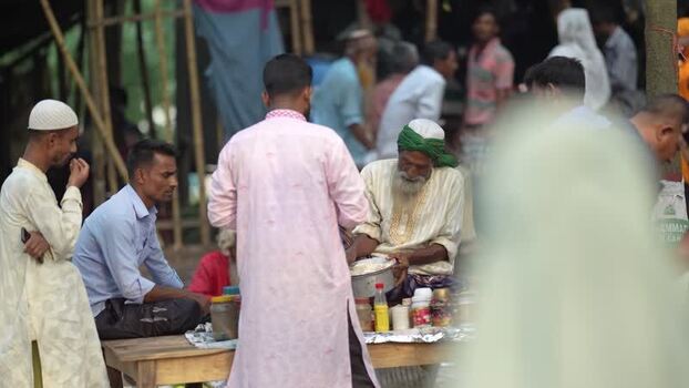 View of men gathering at a market in Bogura Bangladesh.