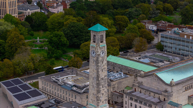 Aerial view of the historic Southampton Civic Centre clock tower surrounded by lush green parkland and urban architecture in Southampton England United Kingdom. Aerial view of the historic Southampton Civic Centre clock tower surrounded by lush green parkland and urban architecture in Southampton England United Kingdom.